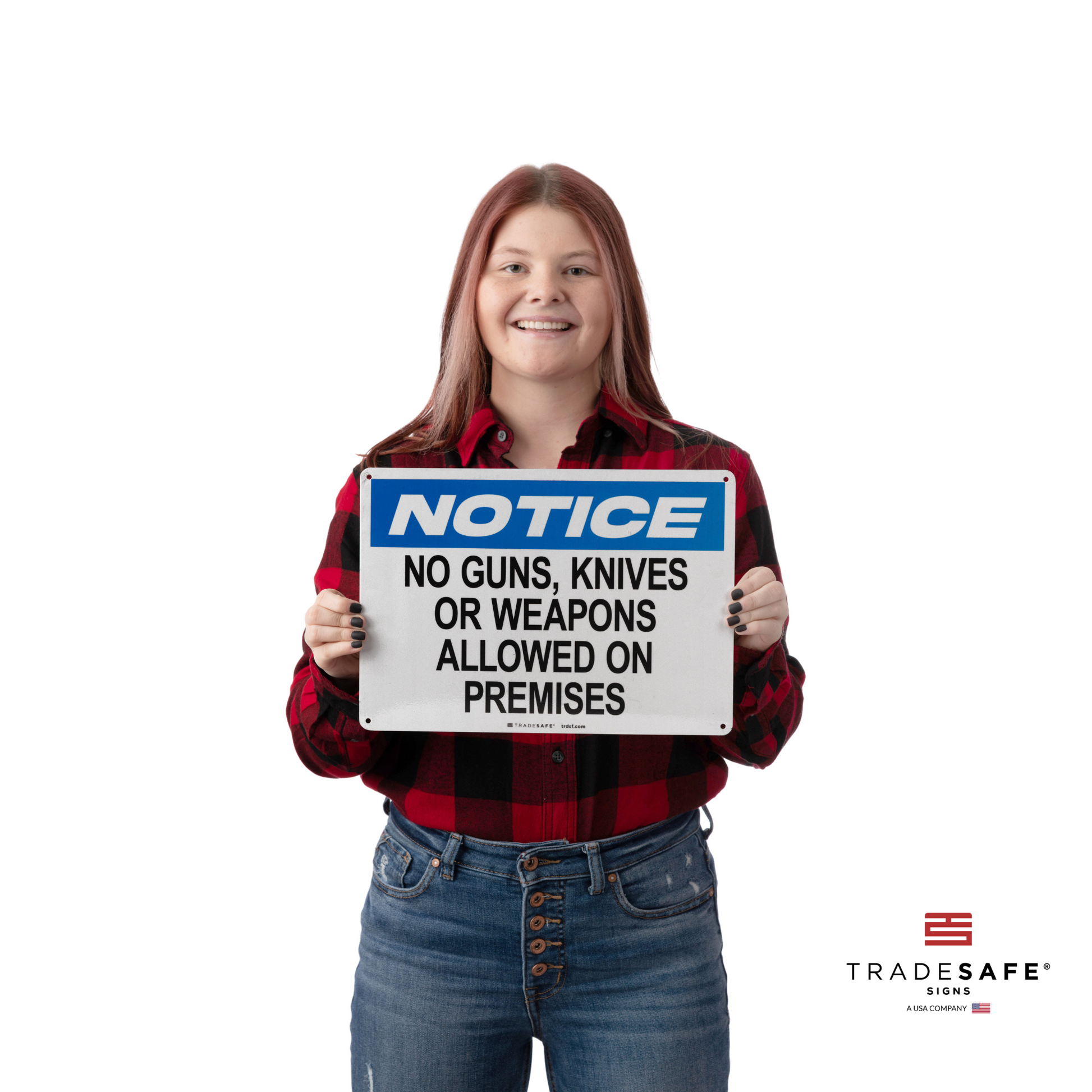 a person holding a notice sign with the text “no guns, knives or weapons allowed on premises”