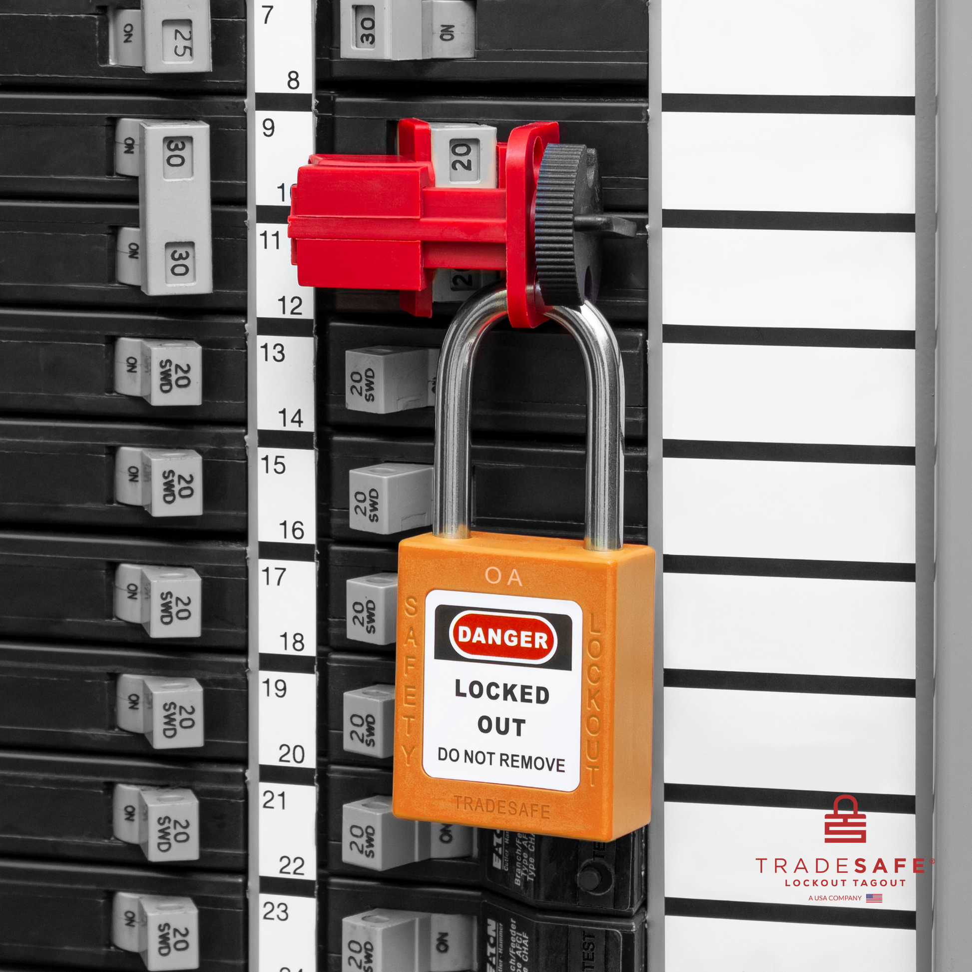 a orange loto padlock in use along with a universal multipole circuit breaker lock 