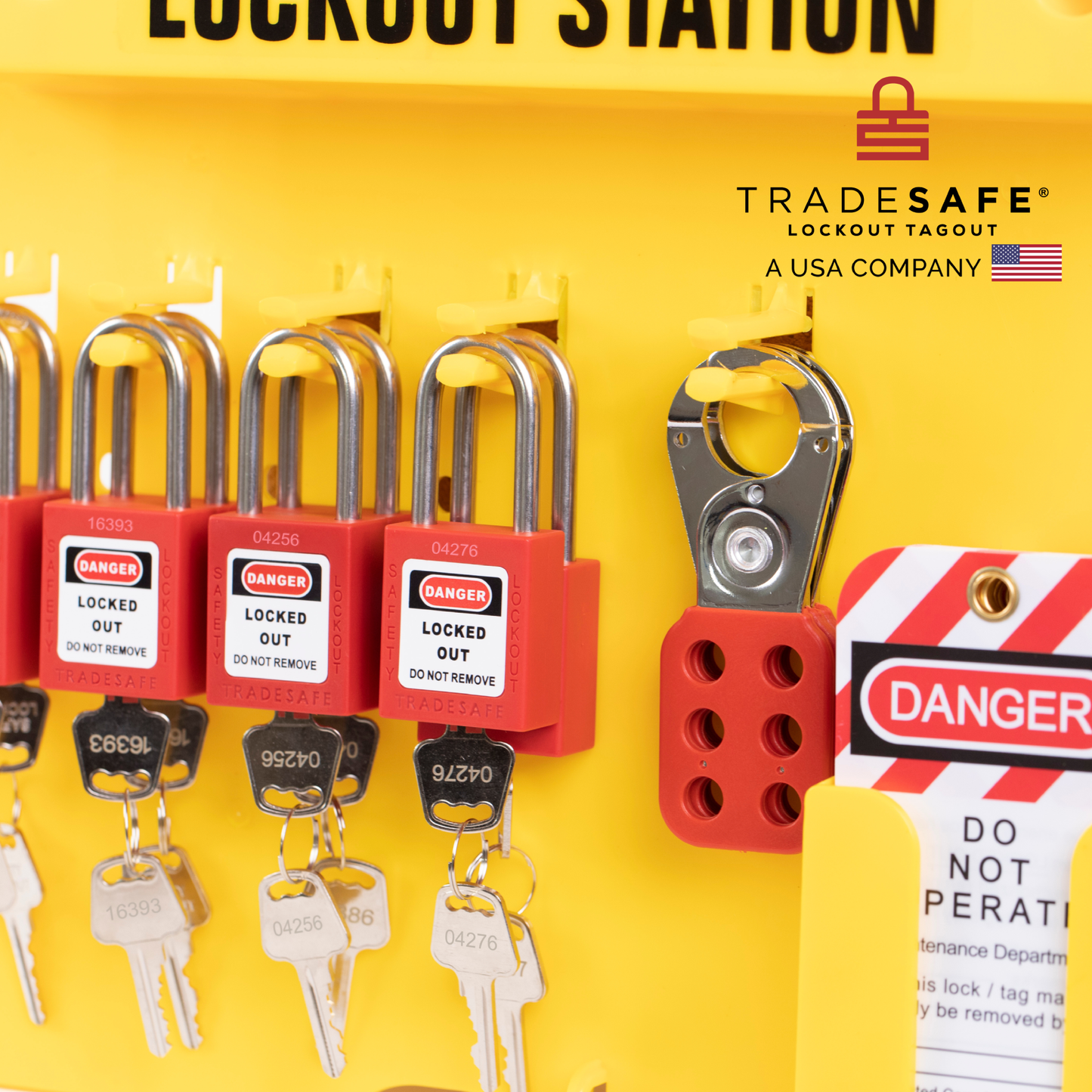 close-up view of a yellow loto station stocked with tags, hasps, and padlocks