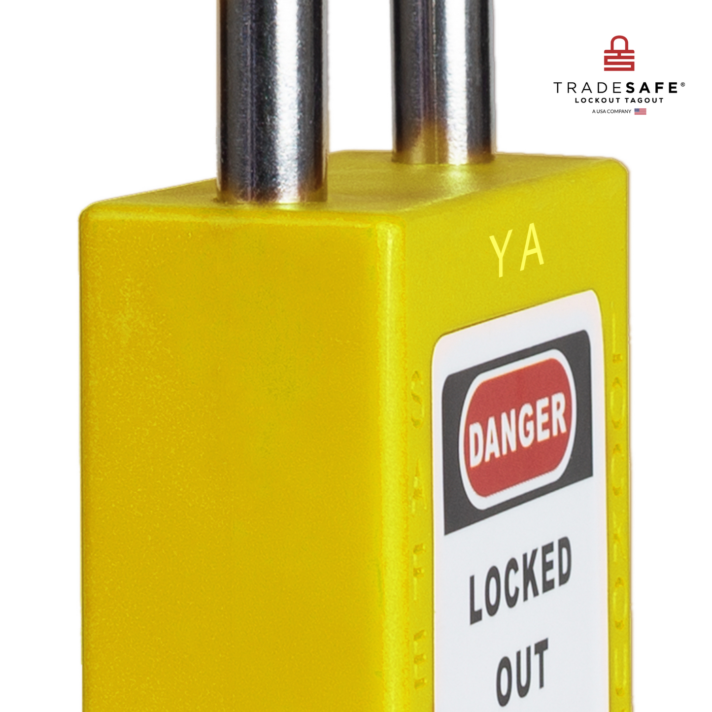close-up slanted view of a yellow loto padlock's body 