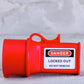 landscape view of a pin and sleeve socket cover with warning label