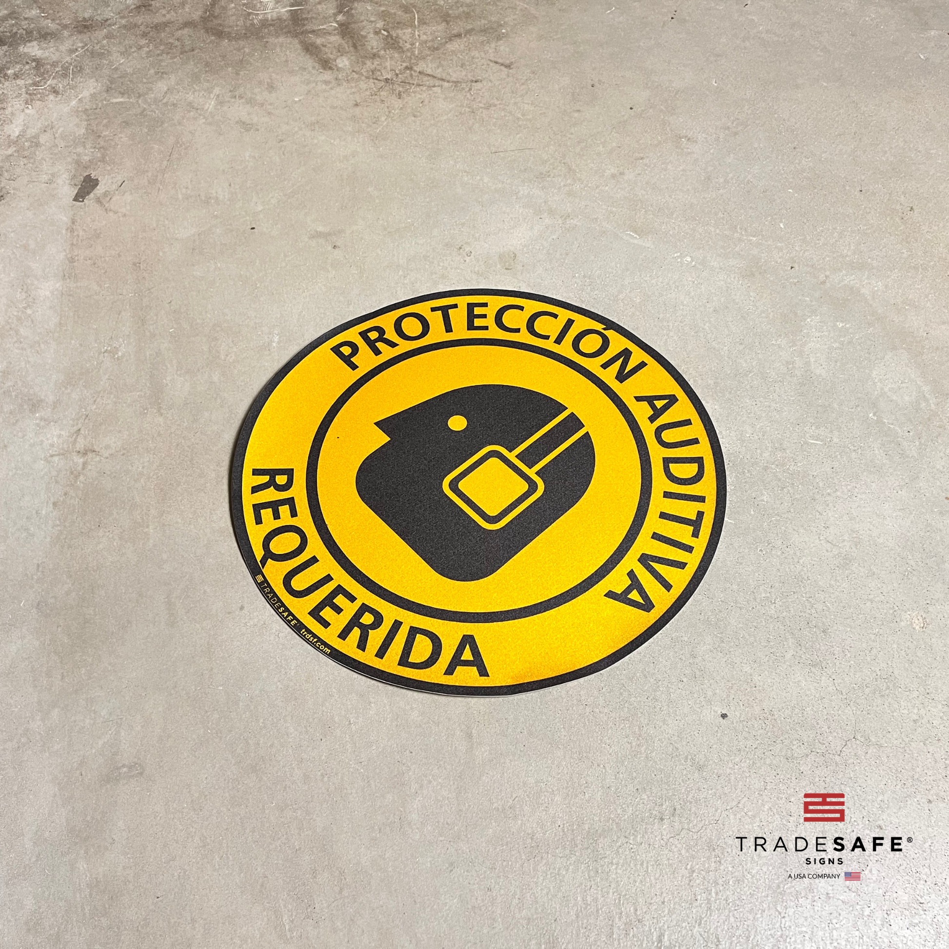 hearing protection required sign in spanish