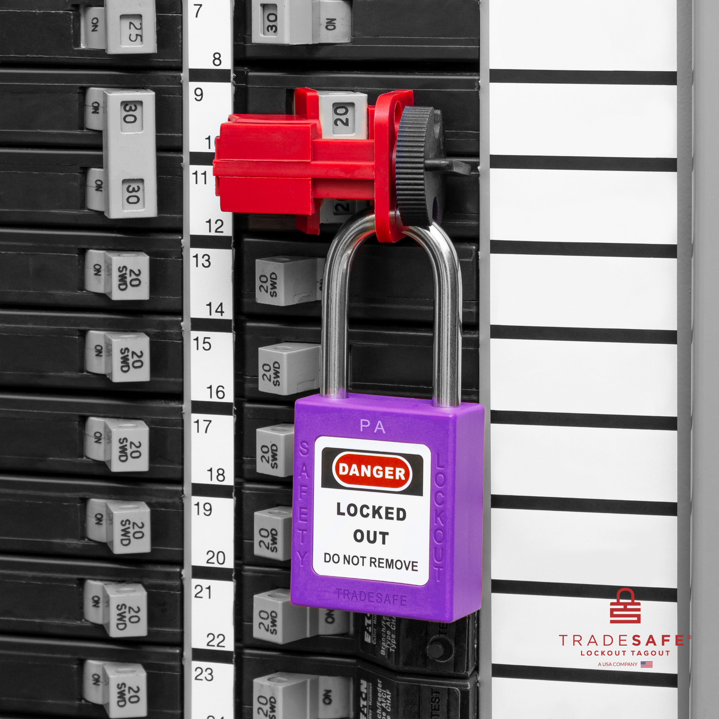 a purple loto padlock in use along with a universal multipole circuit breaker lock 