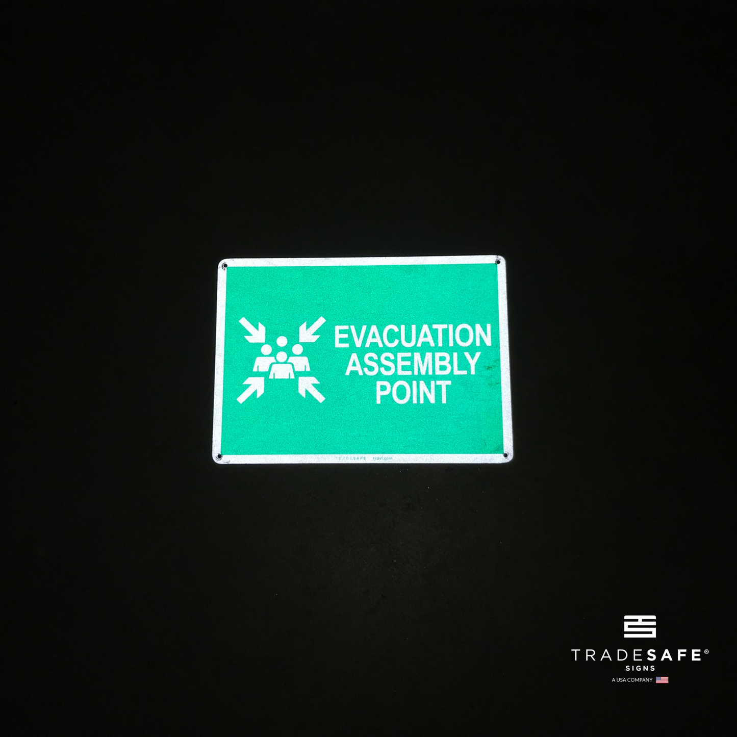 reflective attribute of evacuation sign on black background