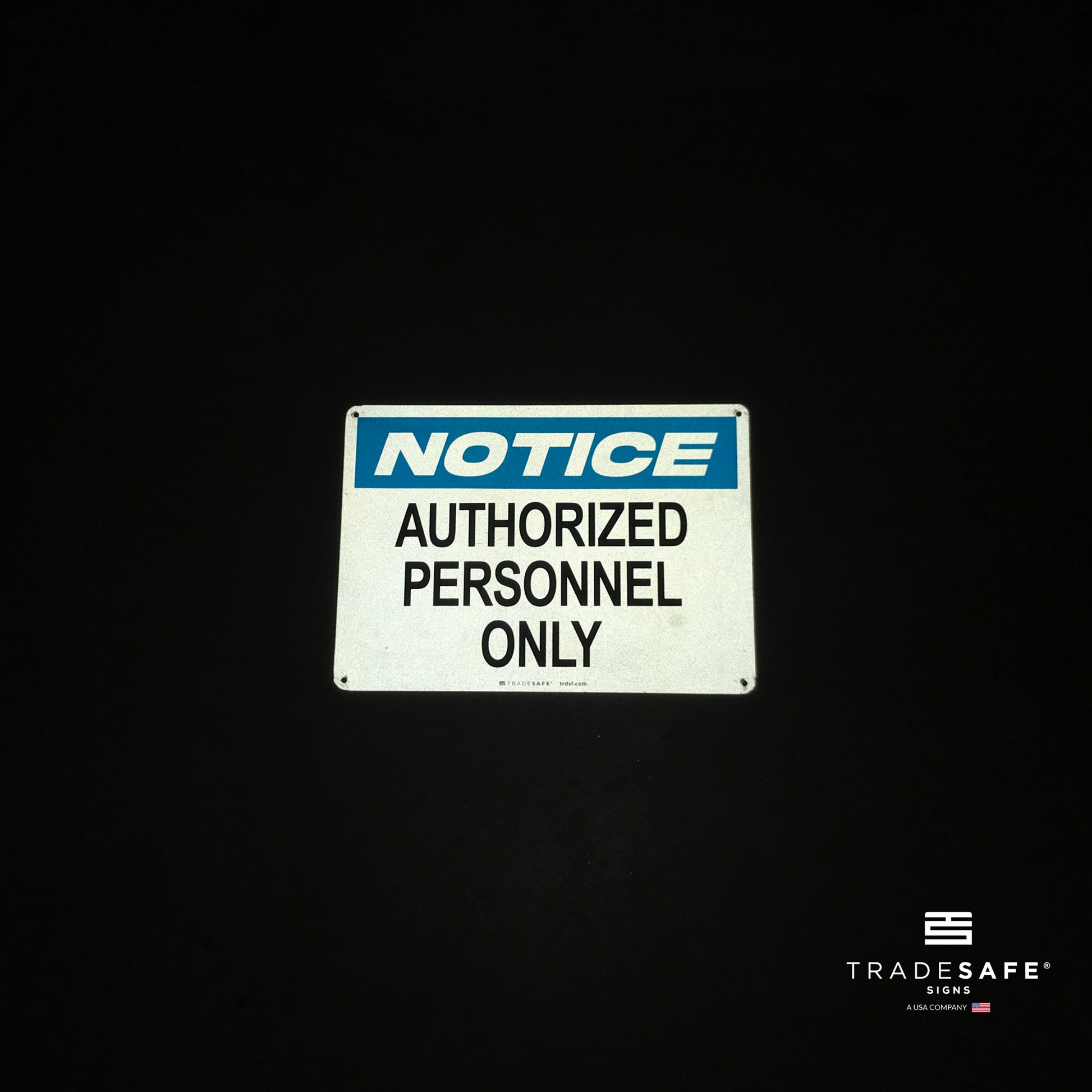 reflective attribute of notice sign on black background