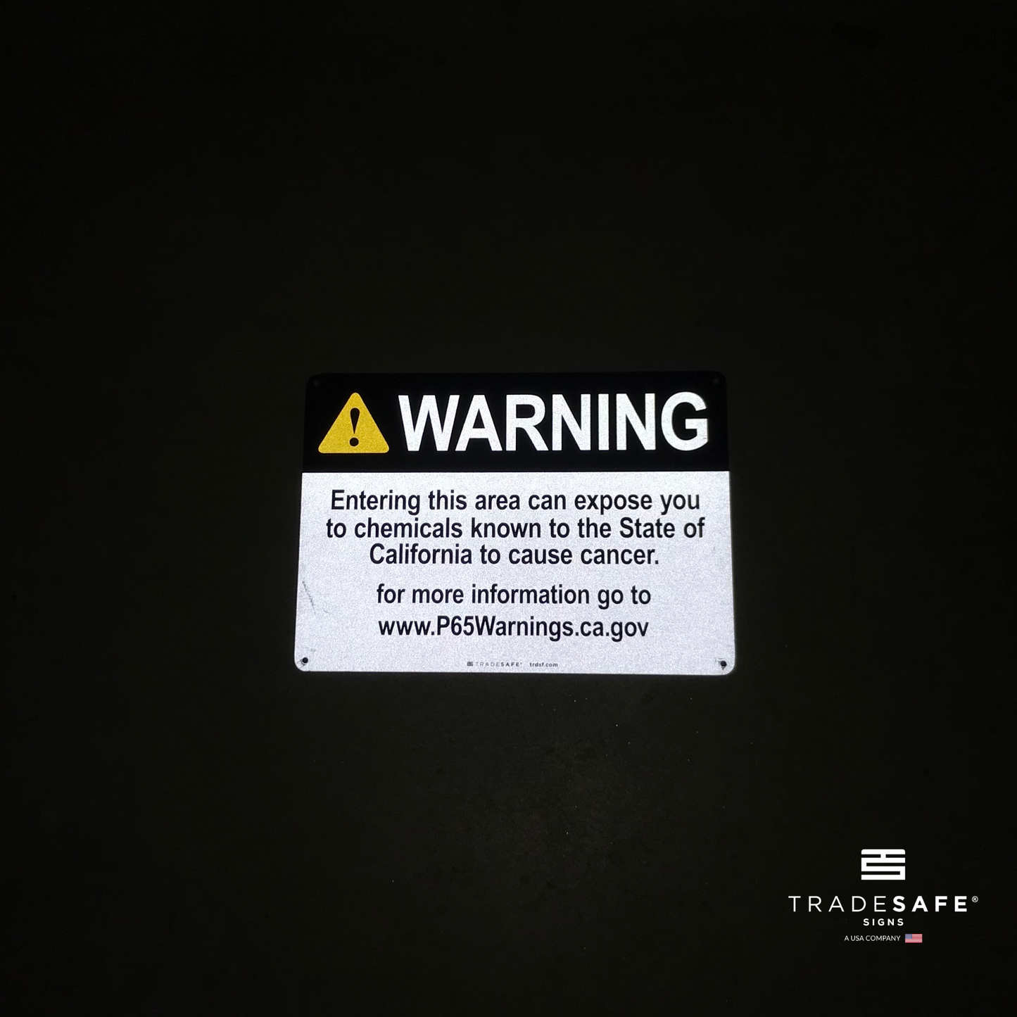 reflective attribute of warning sign on black background
