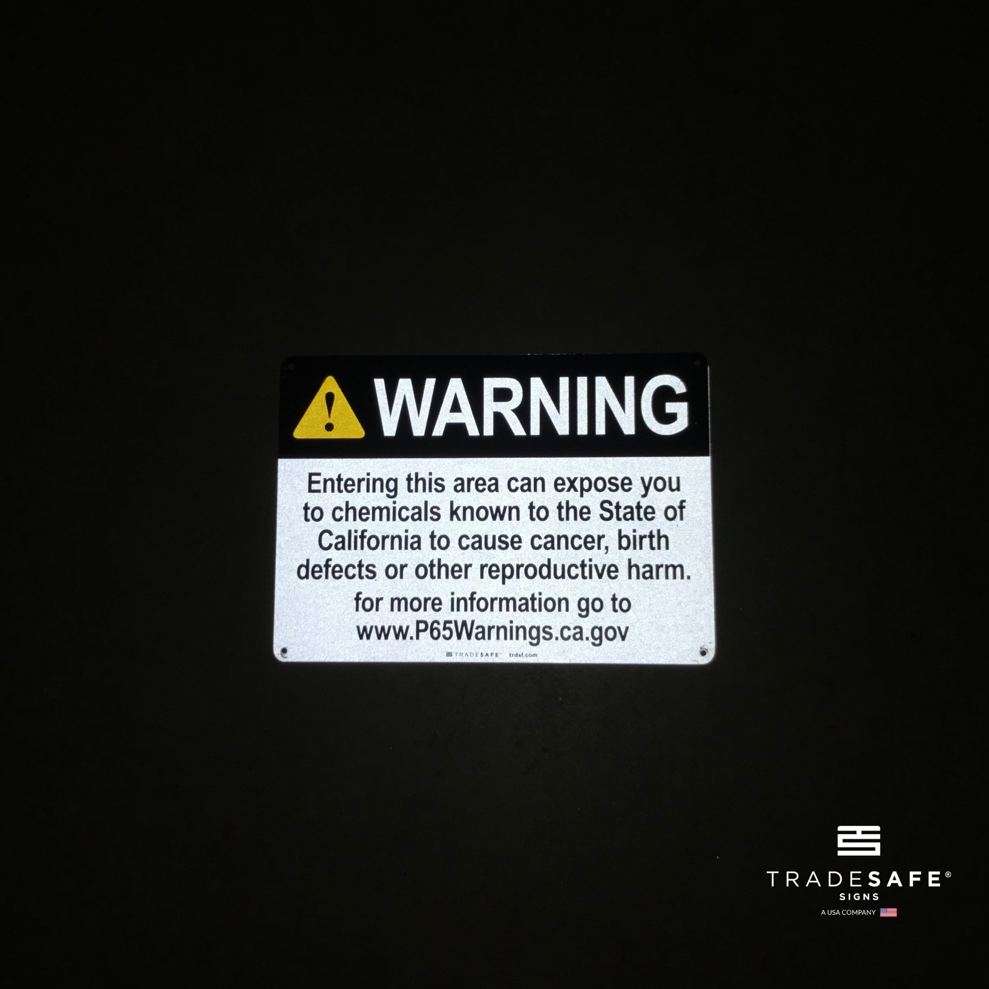 reflective attribute of warning sign on black background