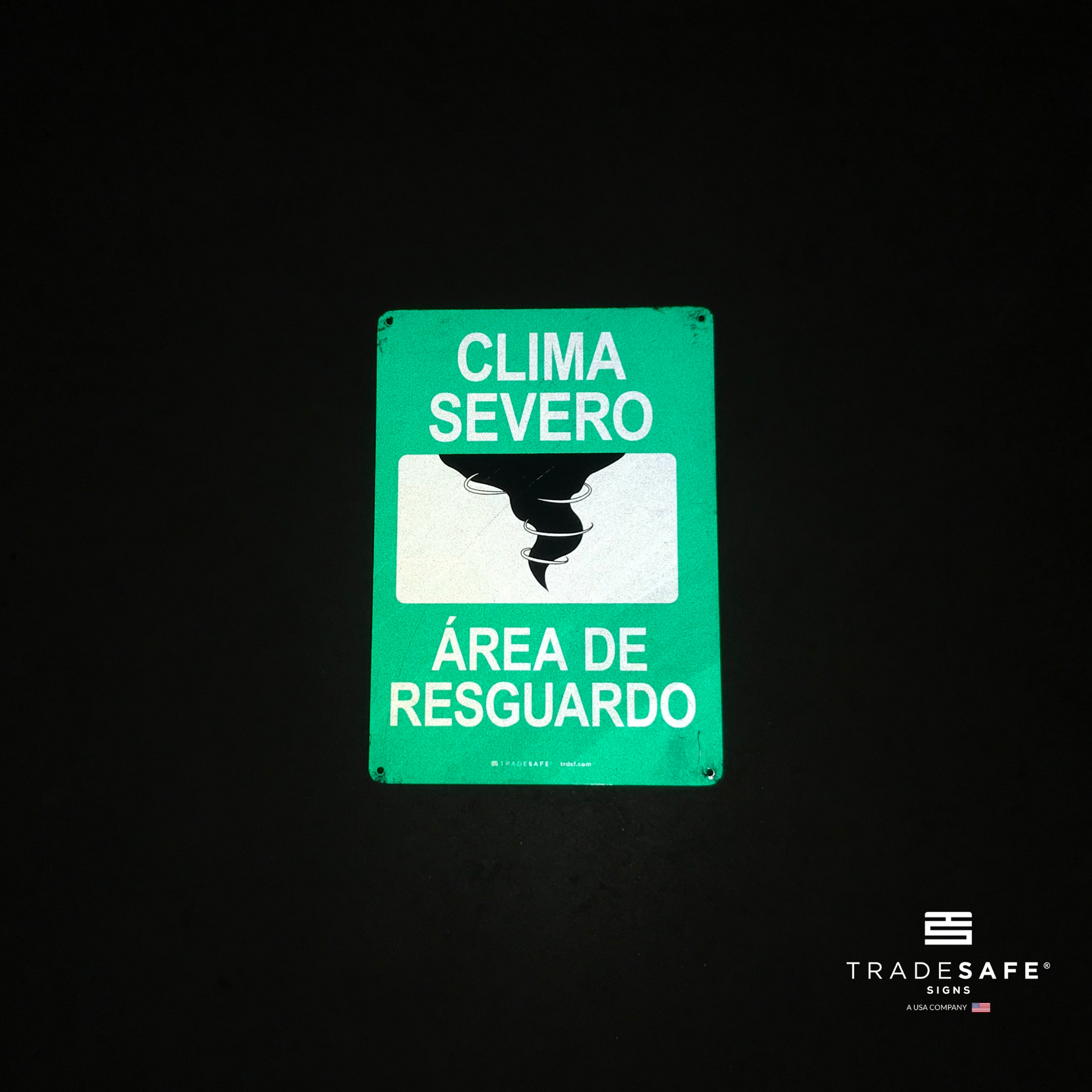 reflective attribute of evacuation sign on black background