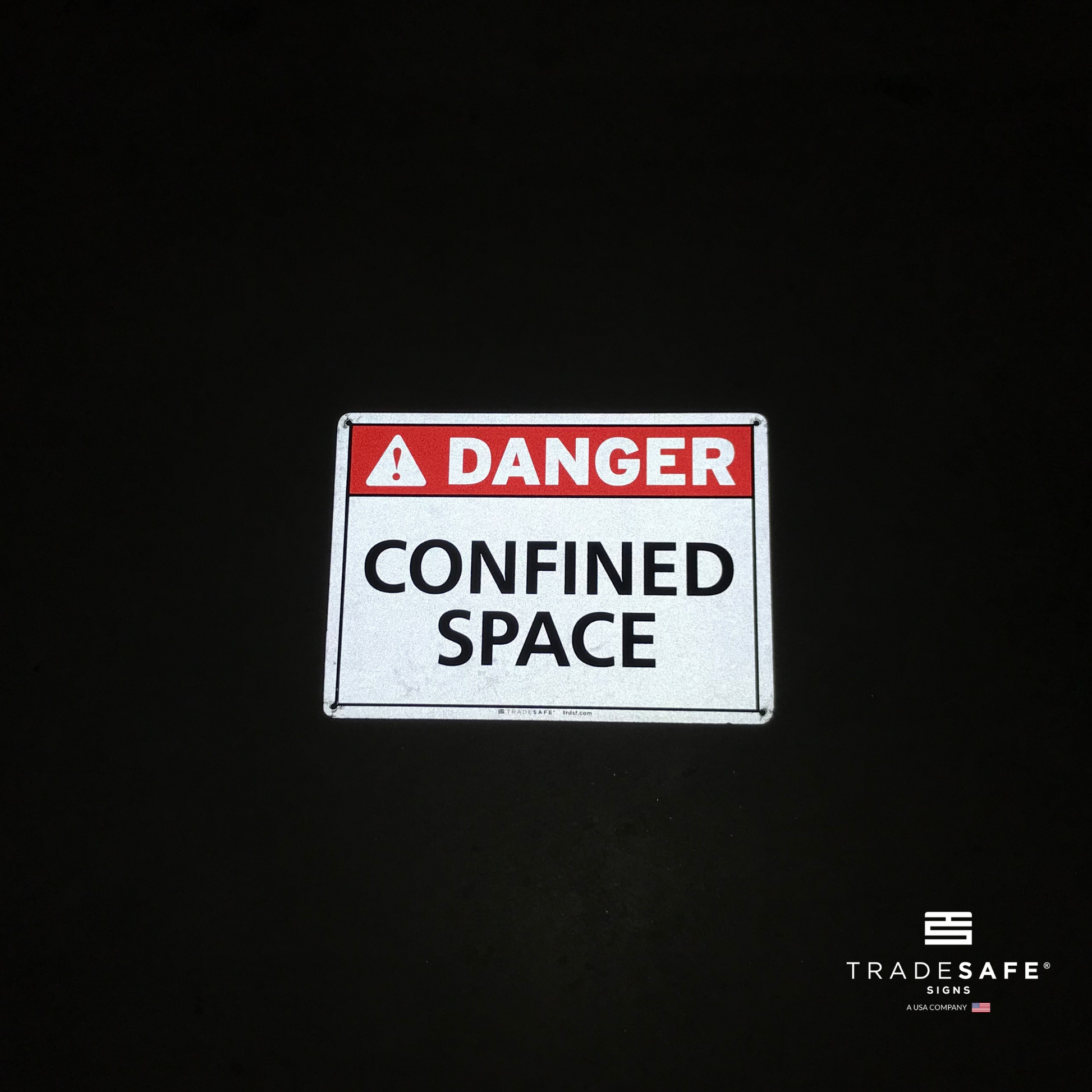 reflective attribute of danger sign on black background