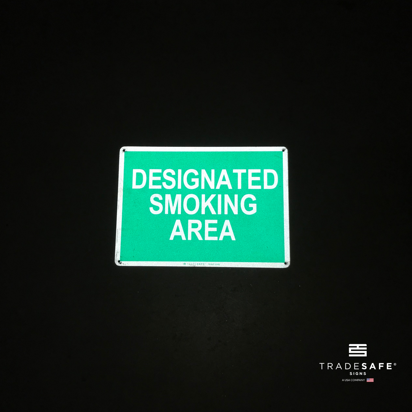 reflective attribute of aluminum smoking sign on black background