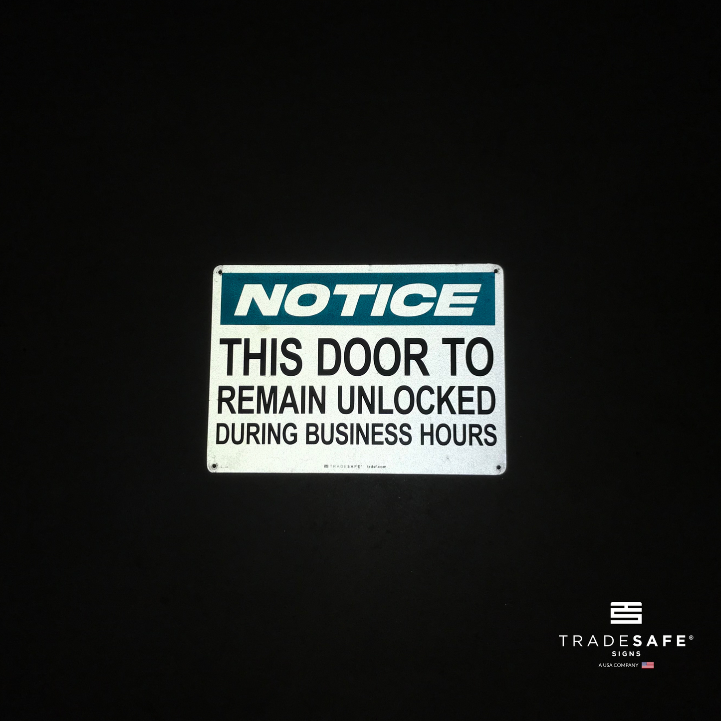 reflective attribute of facility sign on black background
