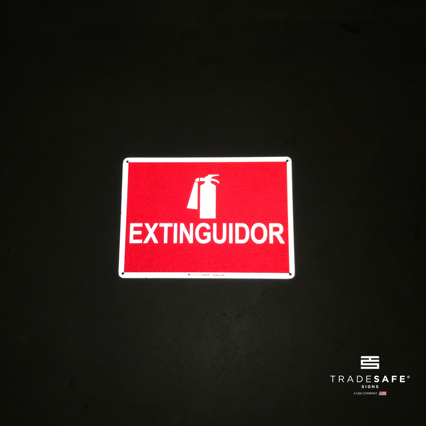 reflective attribute of extinguidor sign on black background