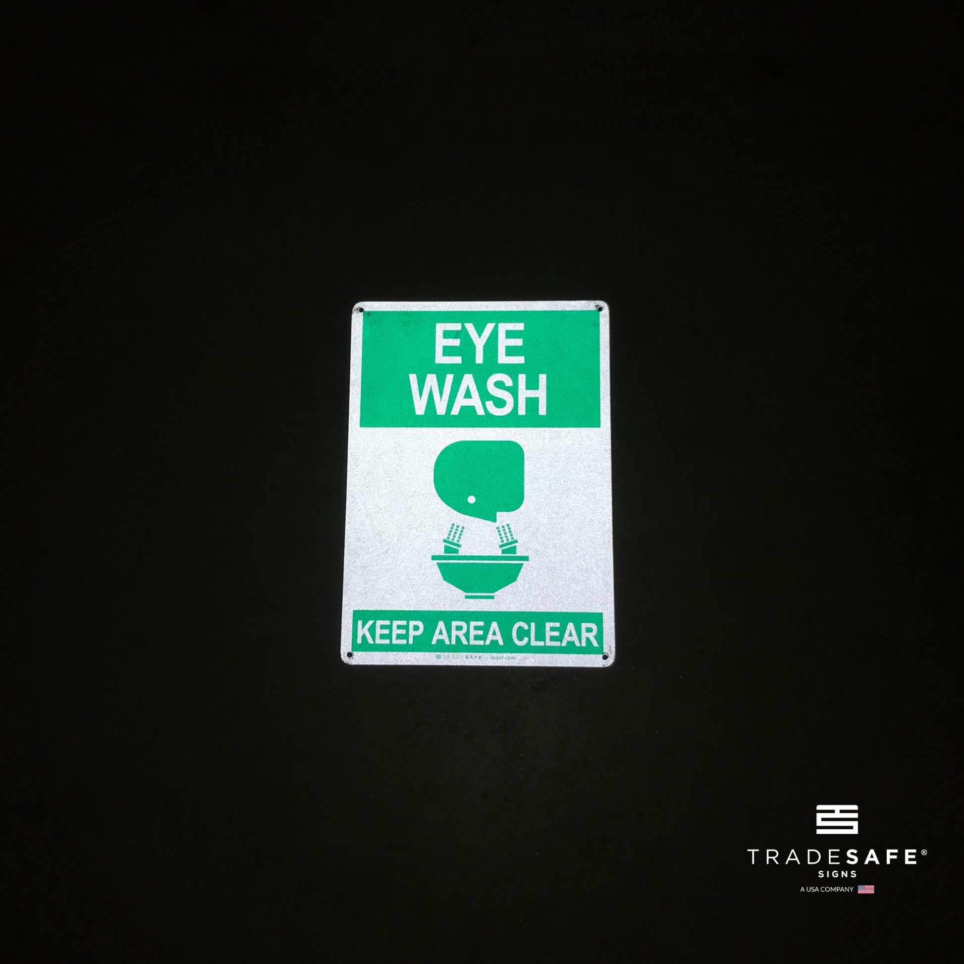 reflective attribute of eye wash sign on black background