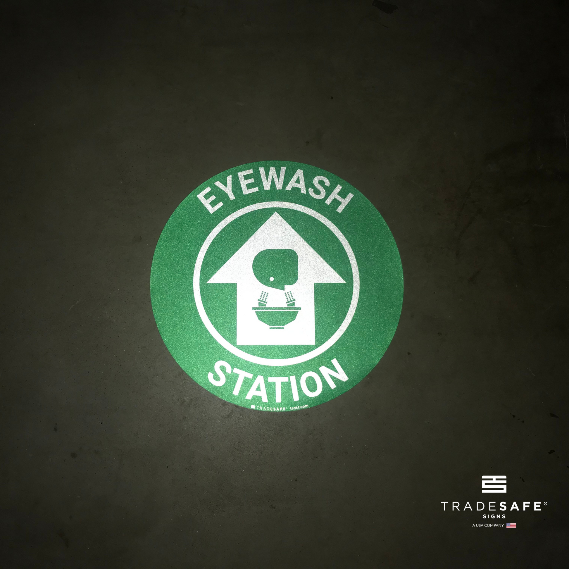 reflective attribute of eyewash station sign on black background