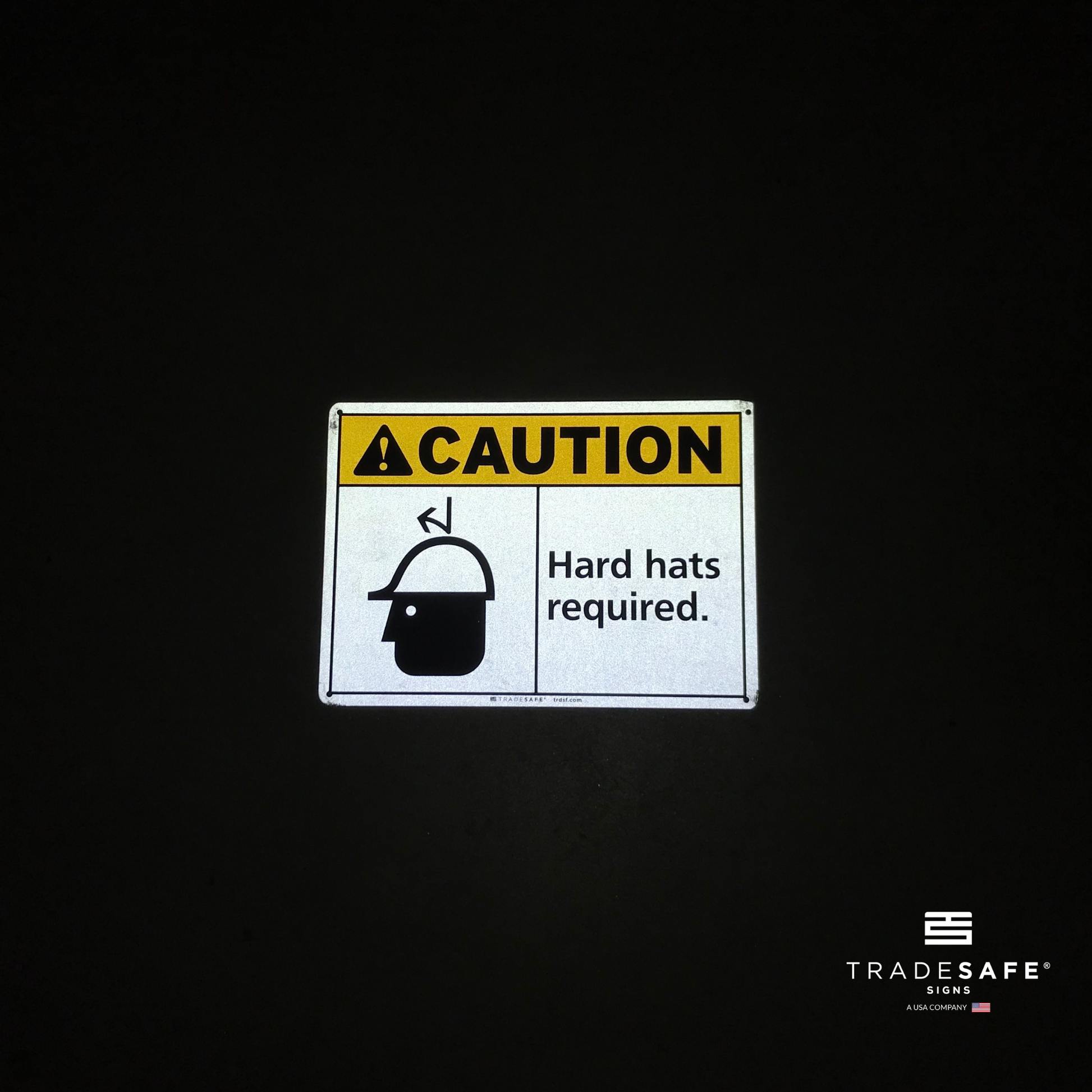 reflective attribute of caution sign on black background