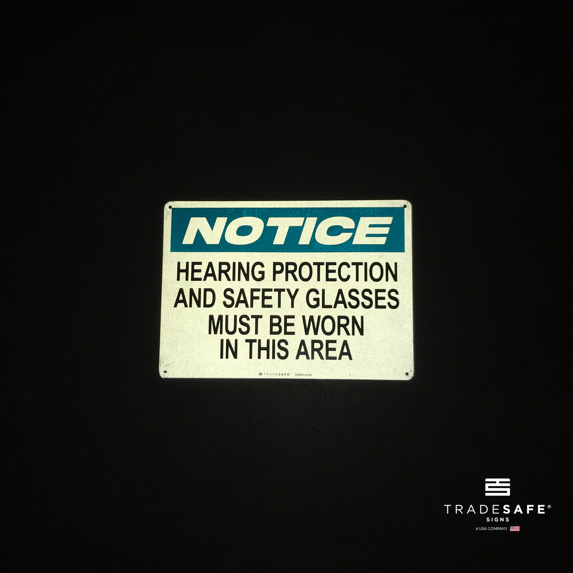 reflective attribute of notice sign on black background