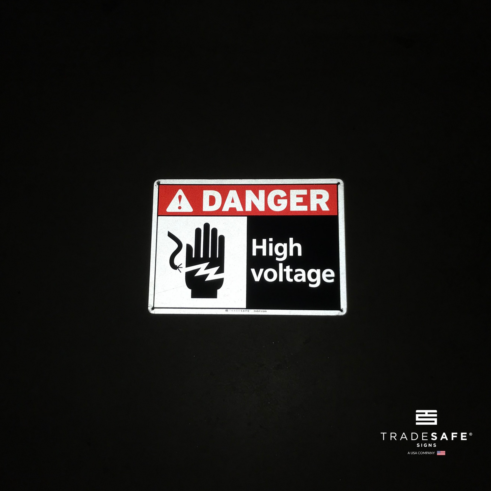reflective attribute of danger sign on black background