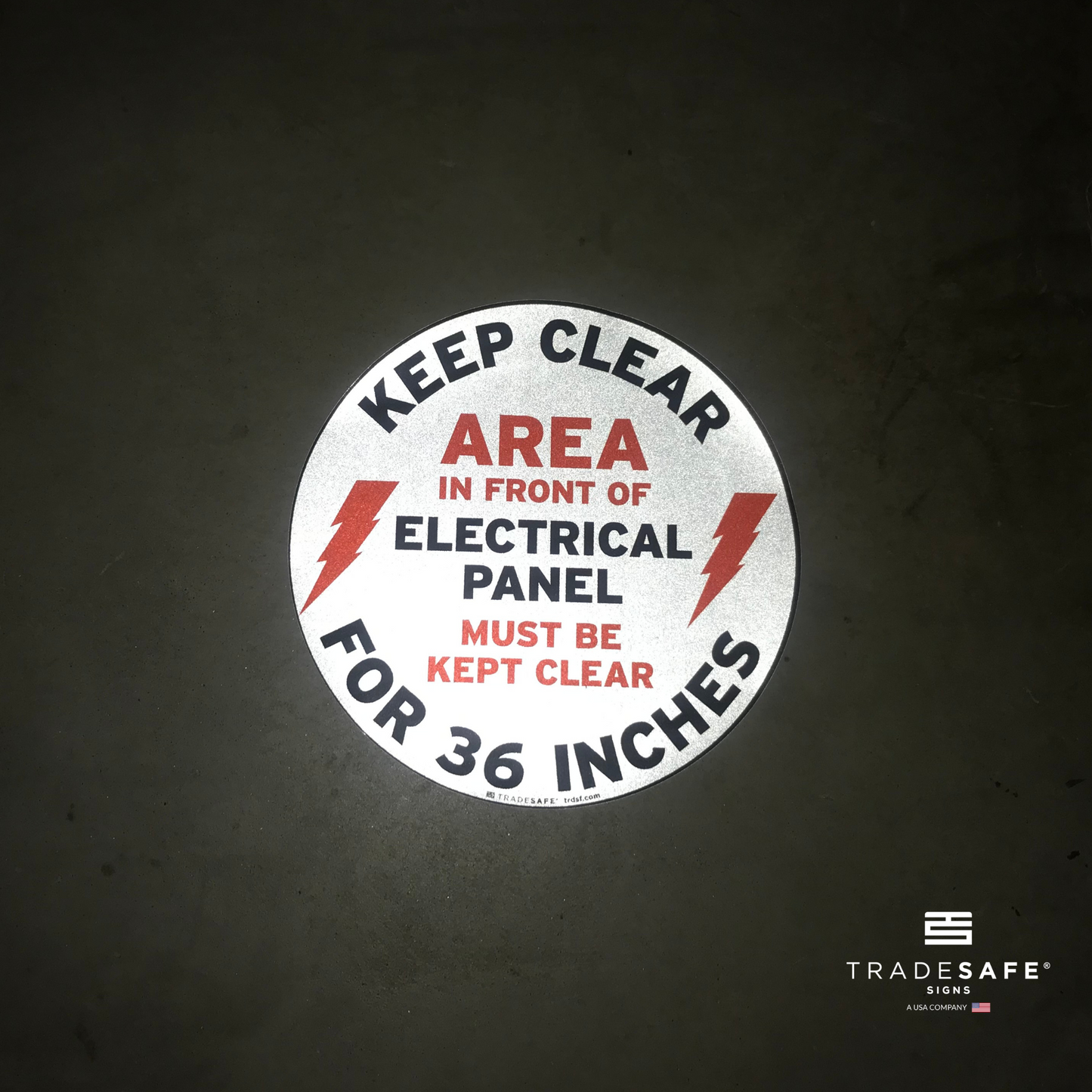 reflective attribute of keep clear electrical panel sign on black background