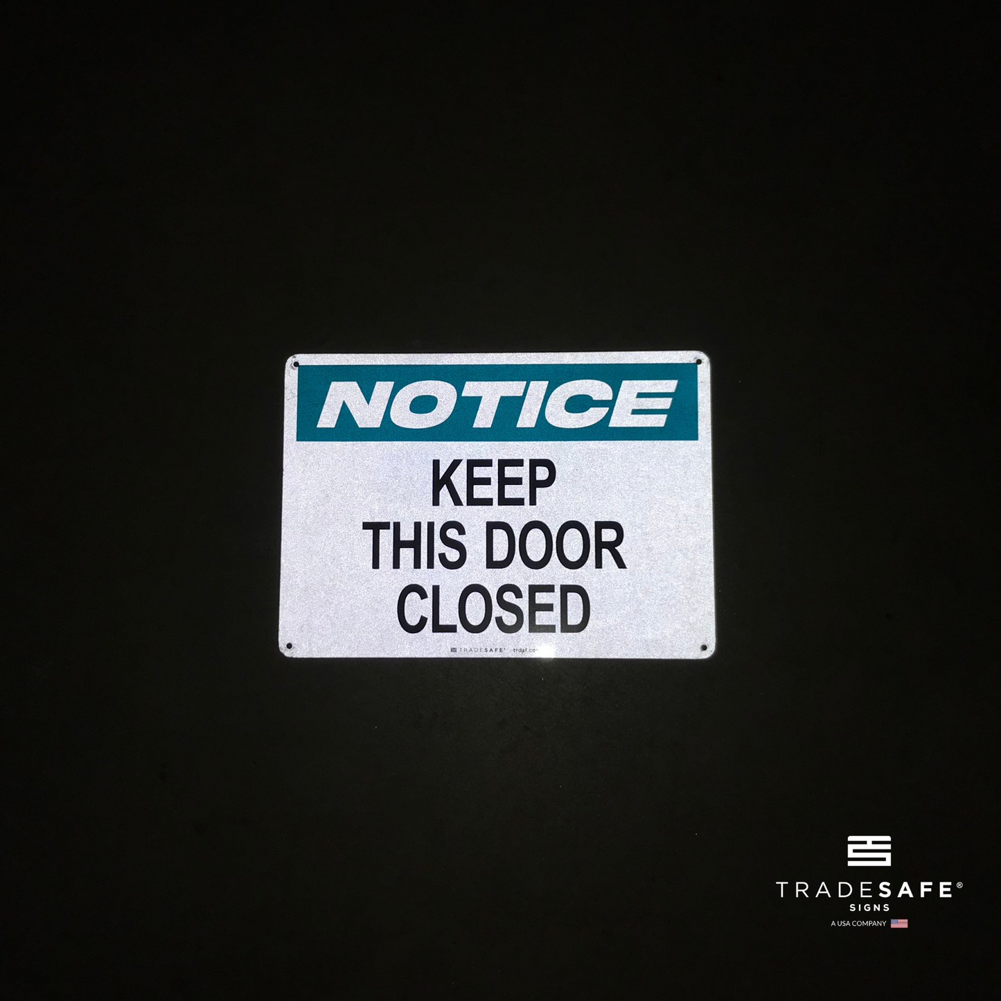 reflective attribute of facility sign on black background