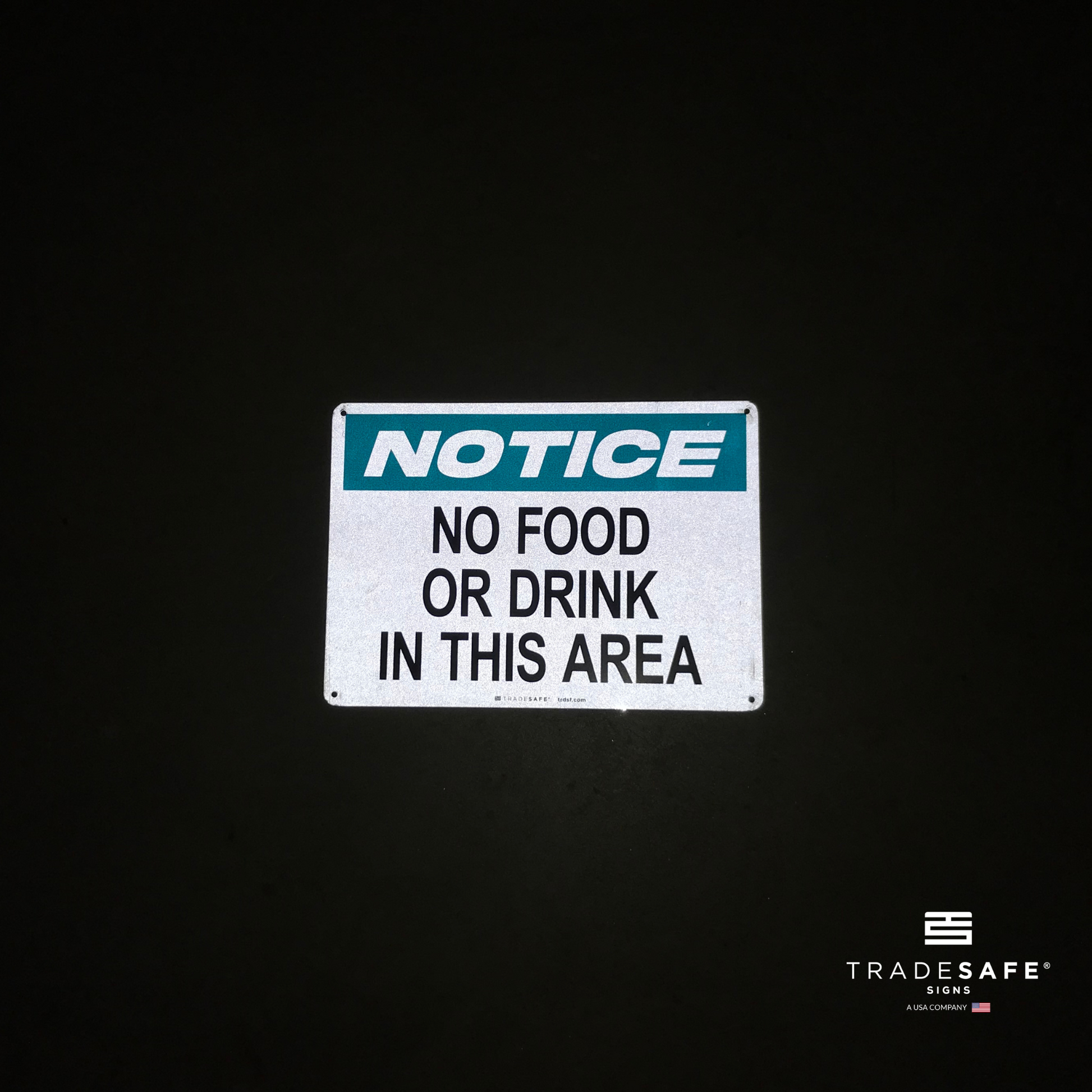 reflective attribute of facility sign on black background