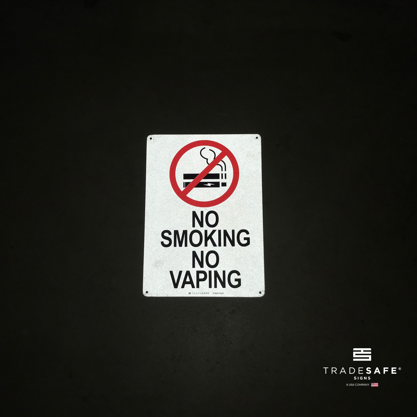 reflective attribute of no smoking no vaping sign on black background