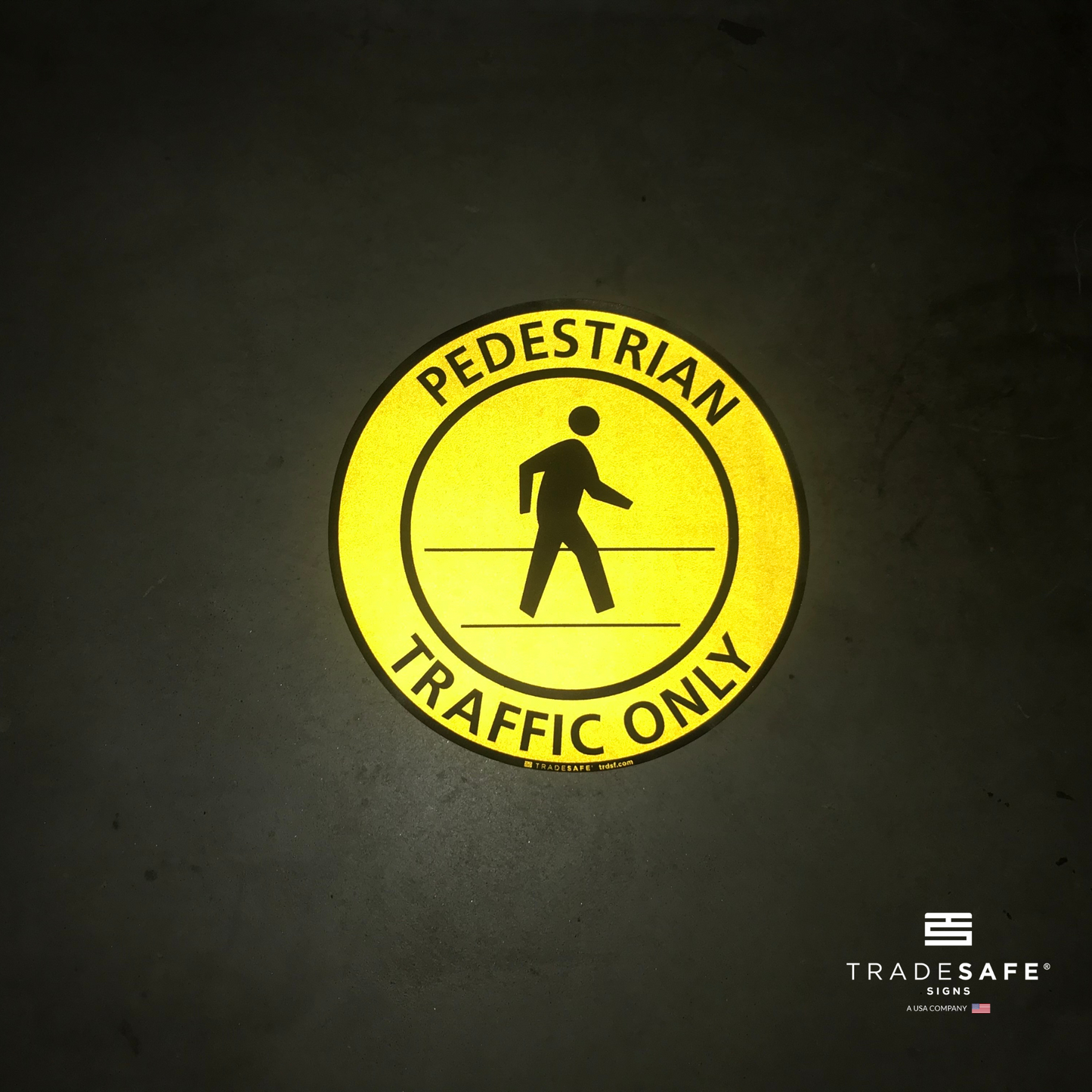 reflective attribute of adhesive vinyl "pedestrian traffic only" sign on black background