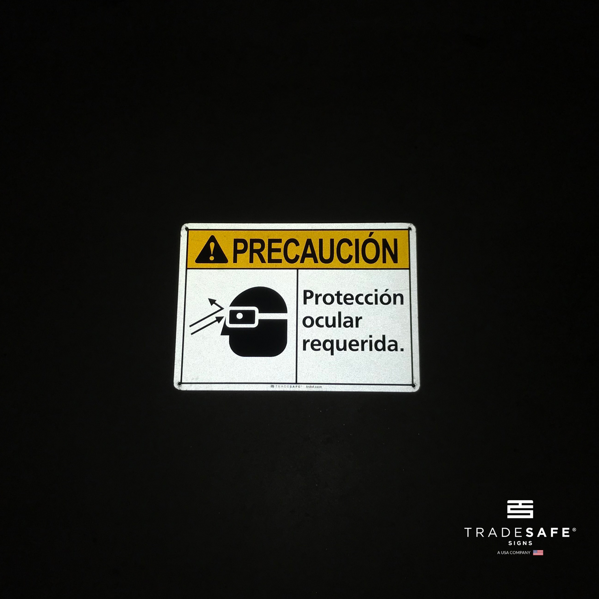 reflective attribute of caution sign on black background