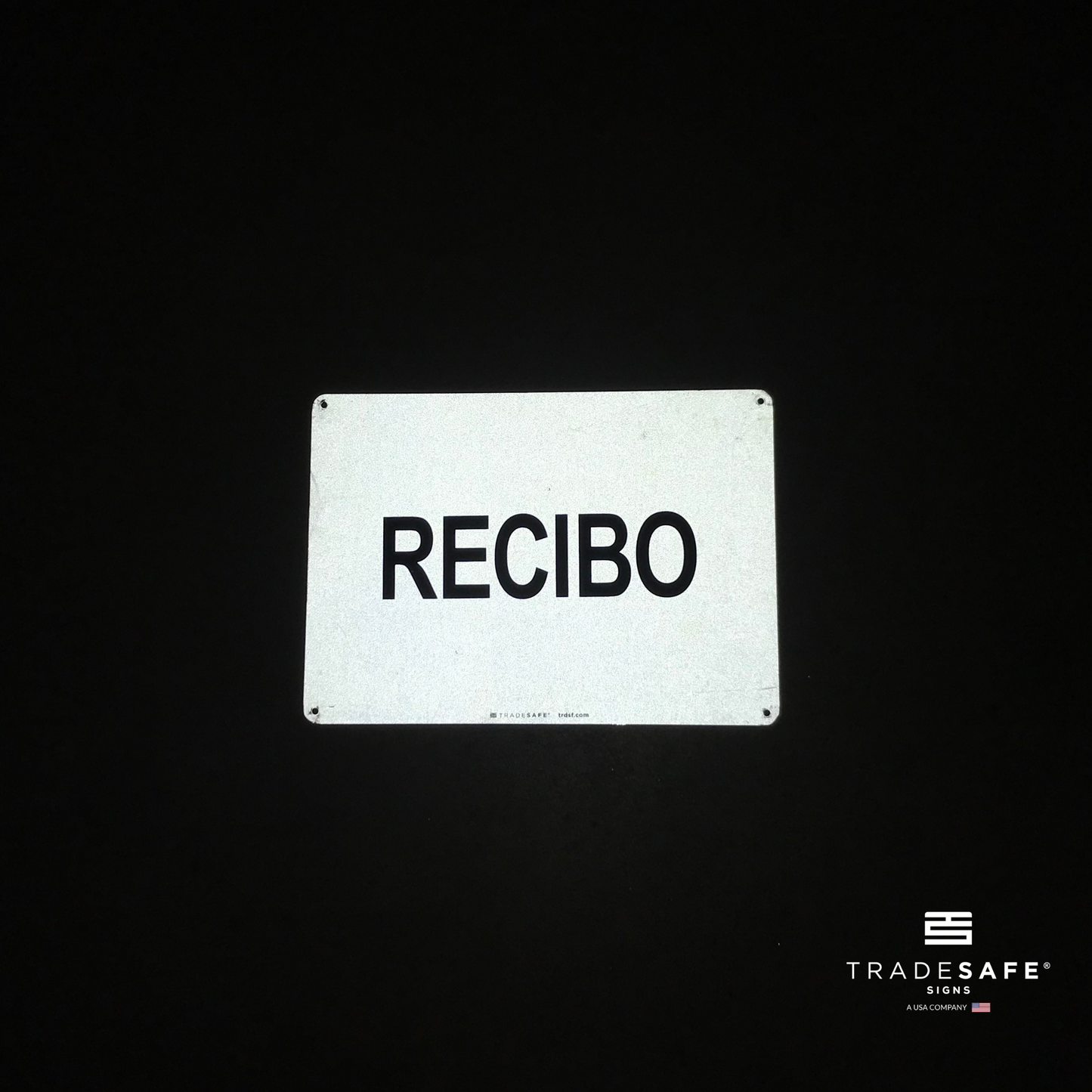reflective attribute of facility sign on black background