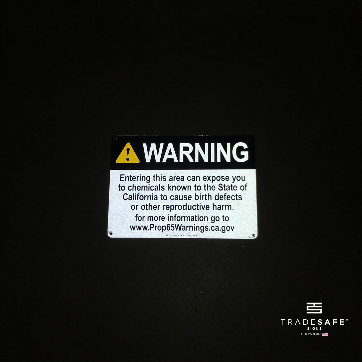 reflective attribute of warning sign on black background
