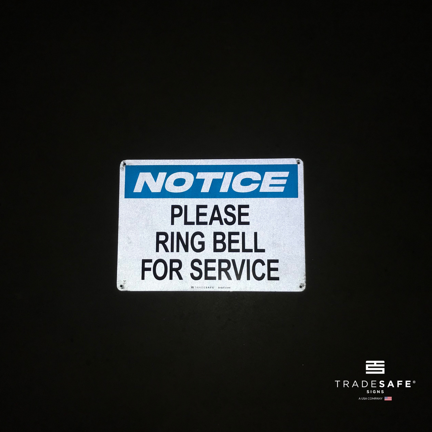 reflective attribute of ring bell for service sign on black background