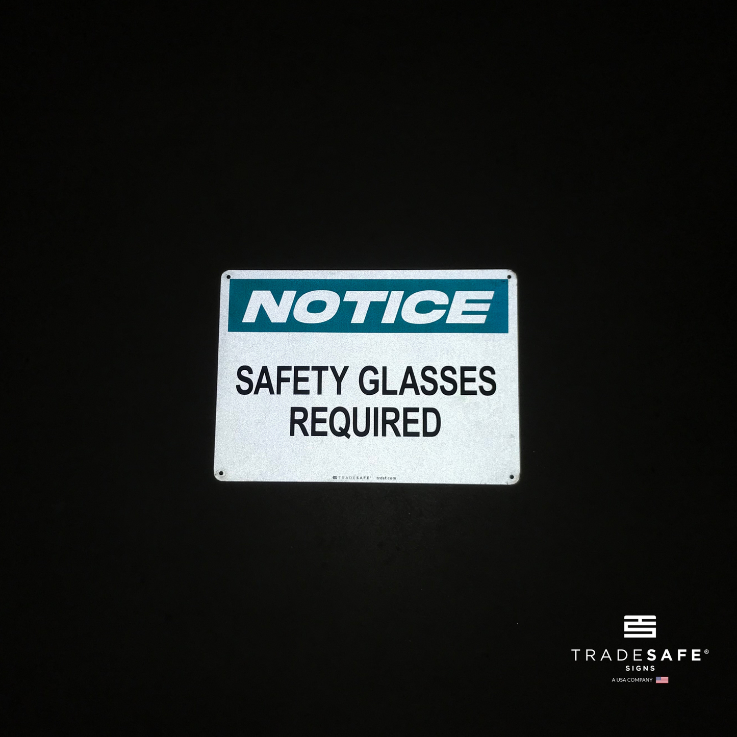 reflective attribute of notice sign on black background