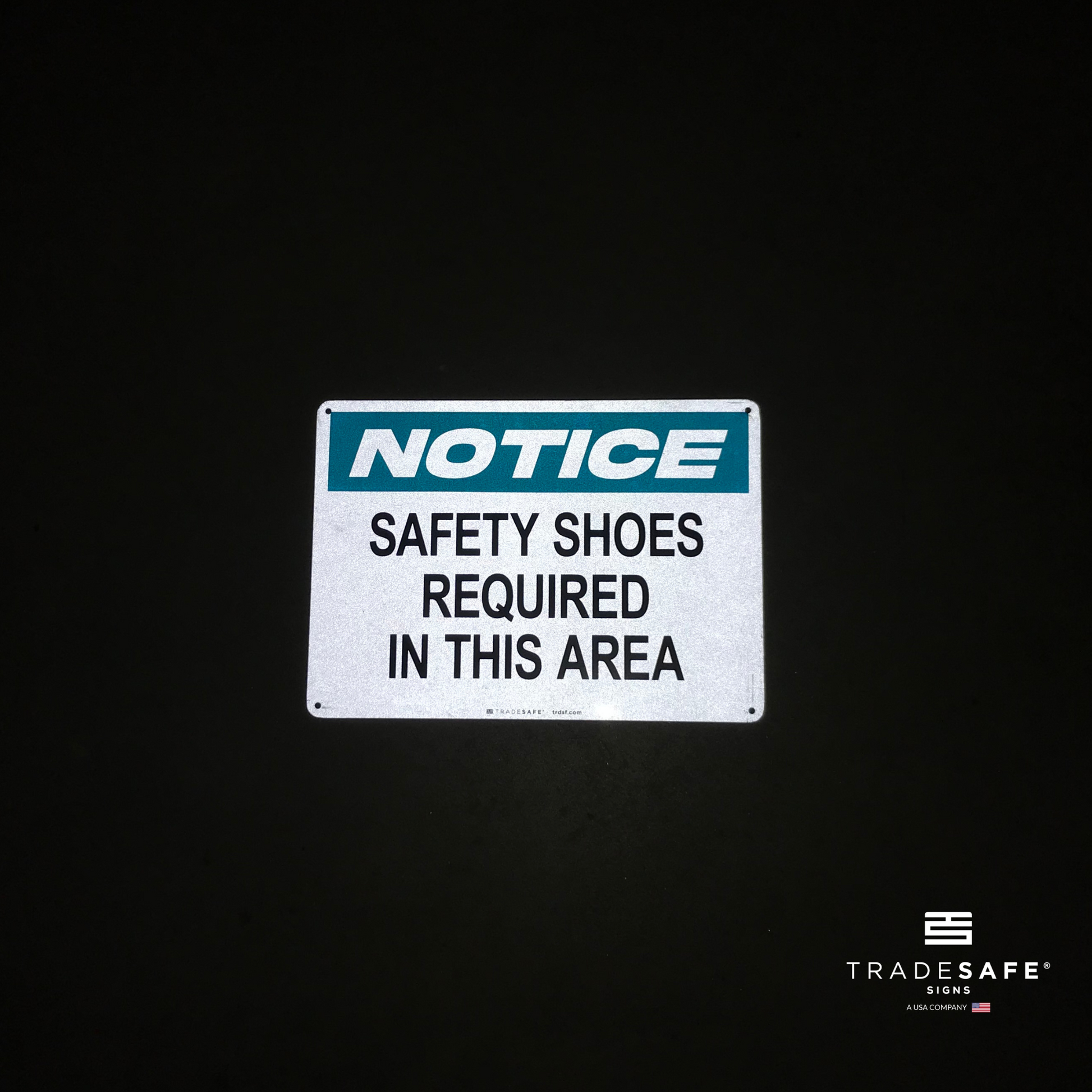 reflective attribute of notice sign on black background