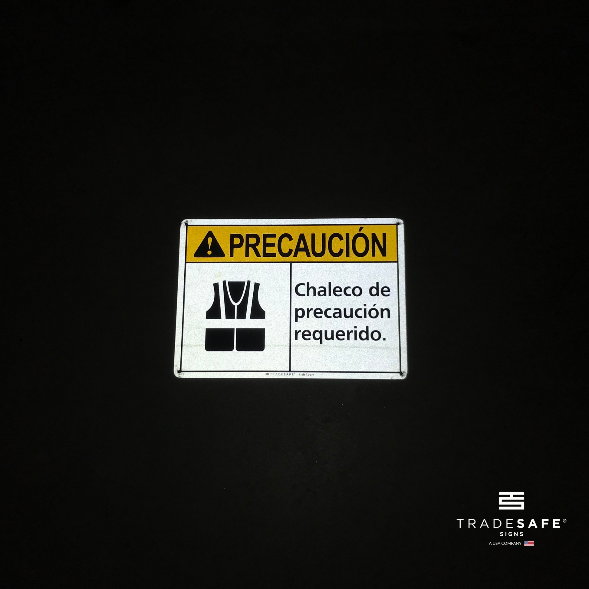 reflective attribute of caution sign on black background