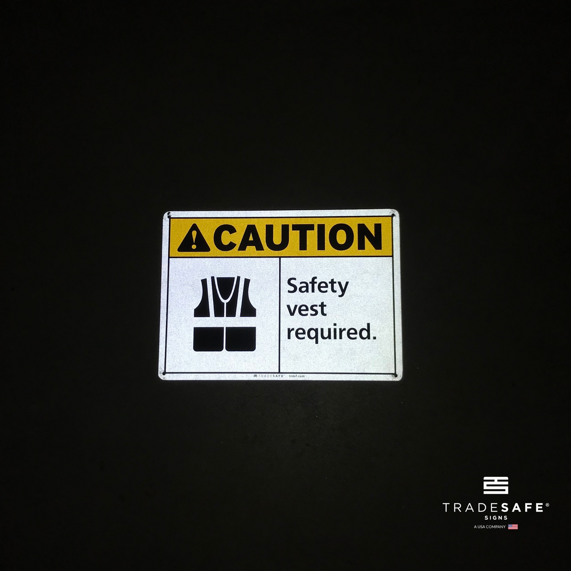 reflective attribute of caution sign on black background