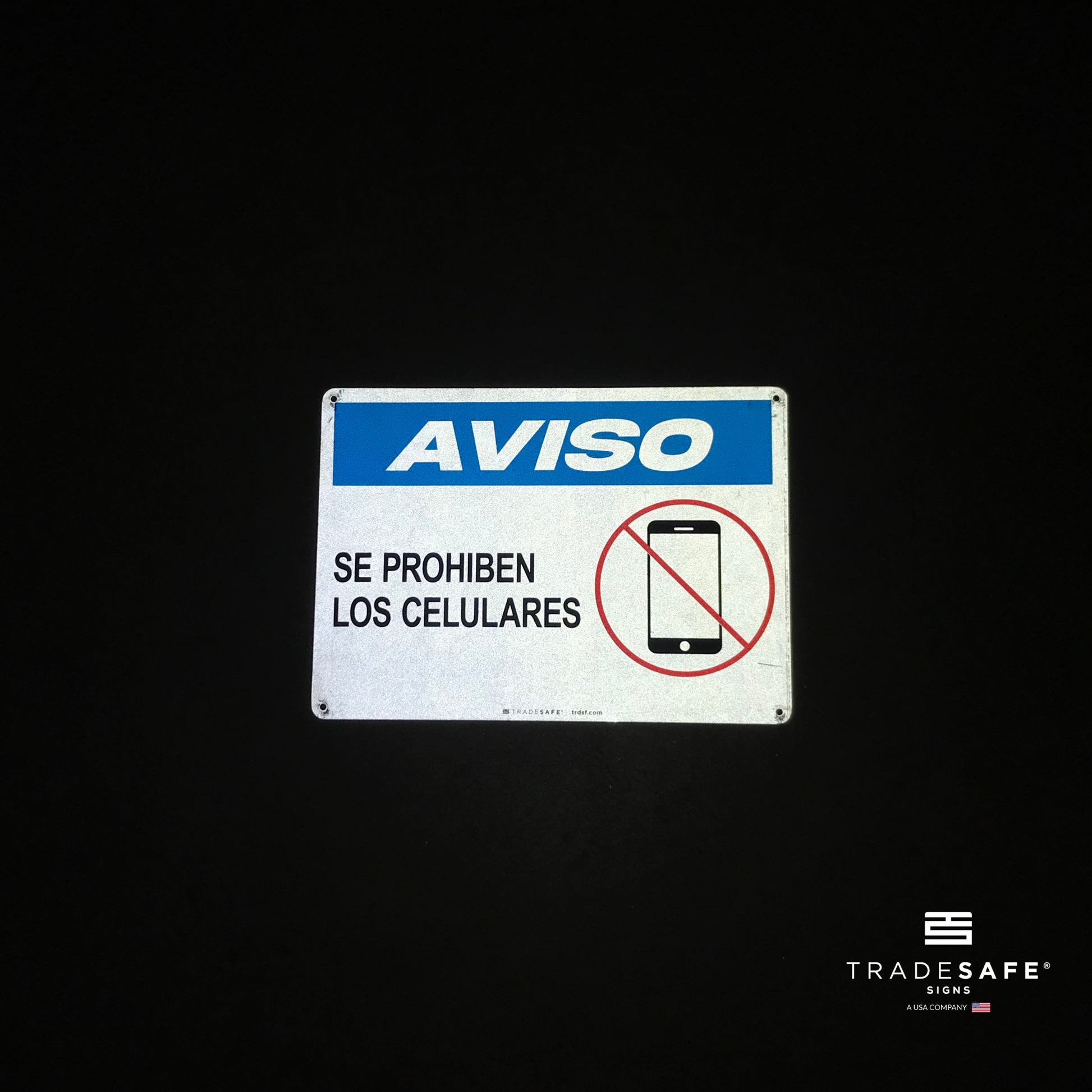 reflective attribute of aviso sign on black background