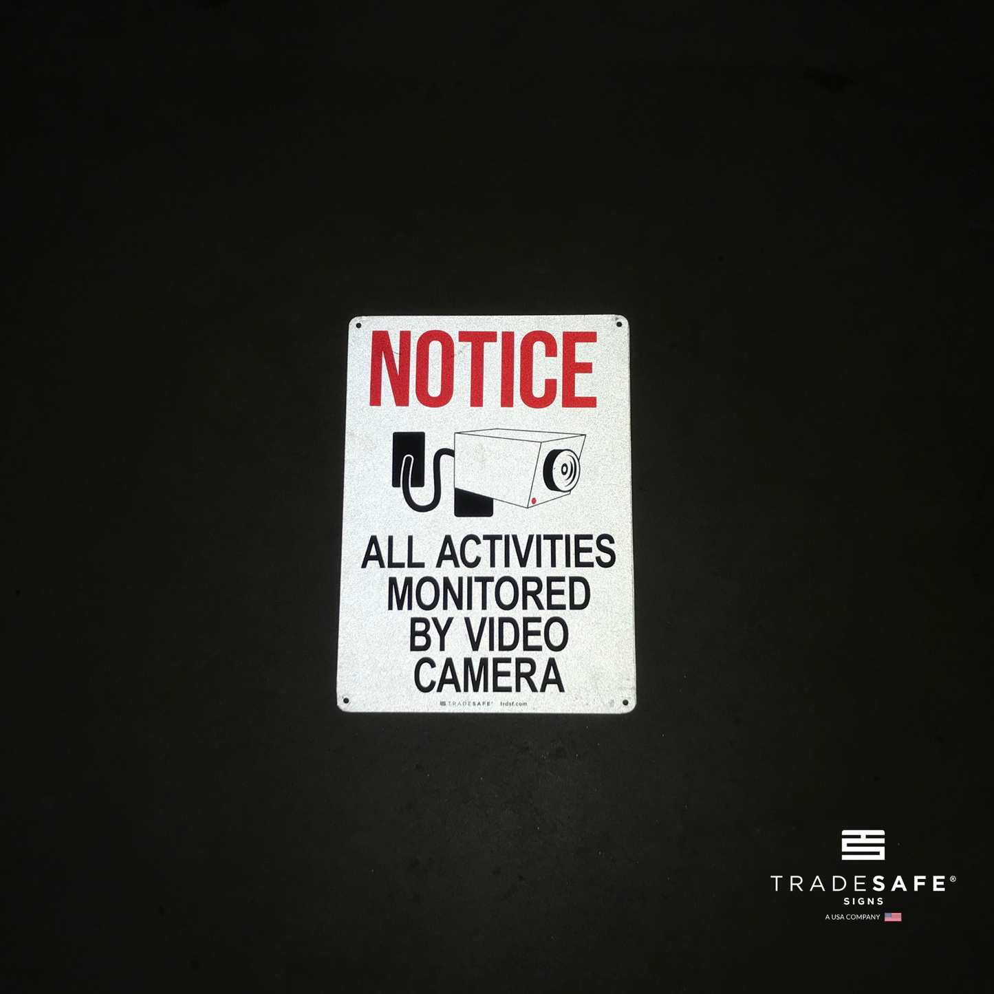 reflective attribute of notice sign on black background