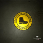 reflective attribute of adhesive vinyl "zapatos de seguridad requeridos" sign in black background