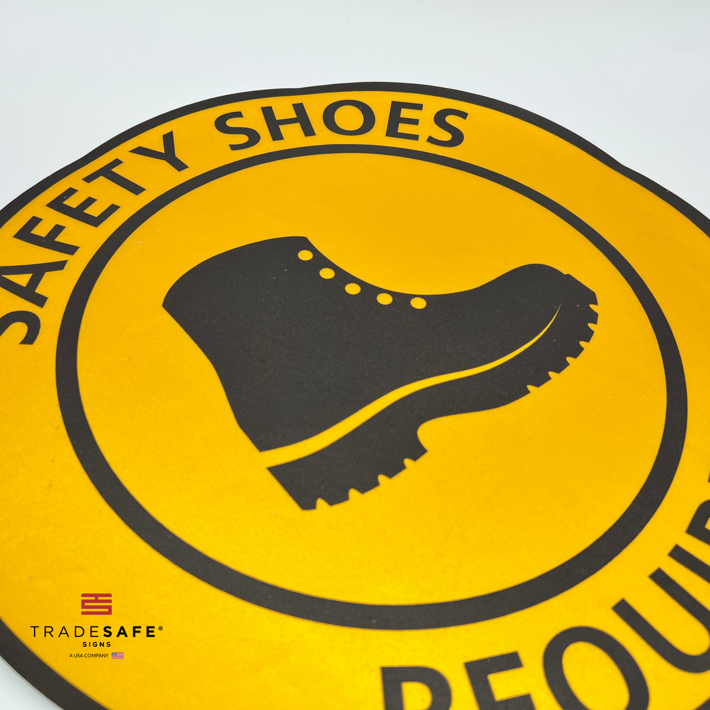 close-up of "safety shoes required" sign