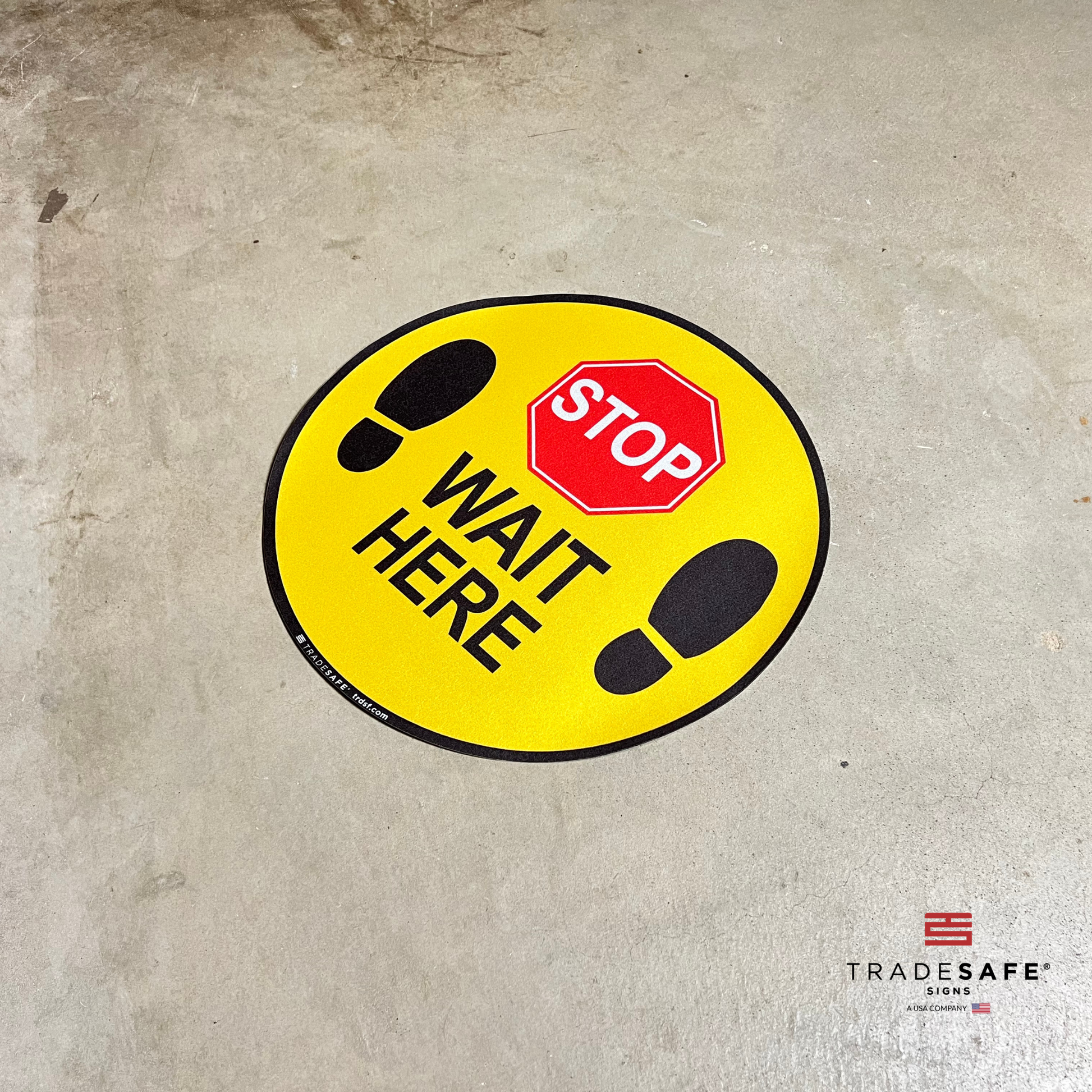 stop wait here sign on floor