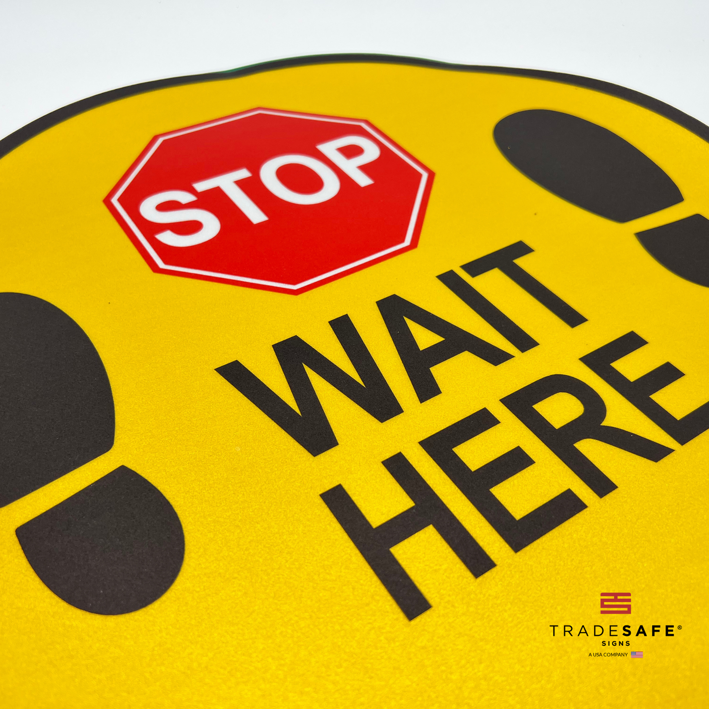 close-up of stop wait here sign