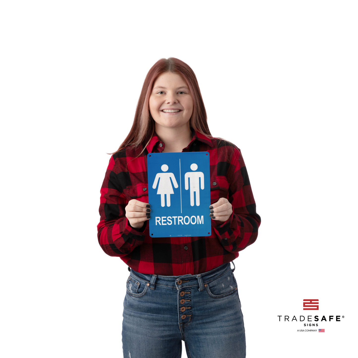 a person holding the unisex restroom sign