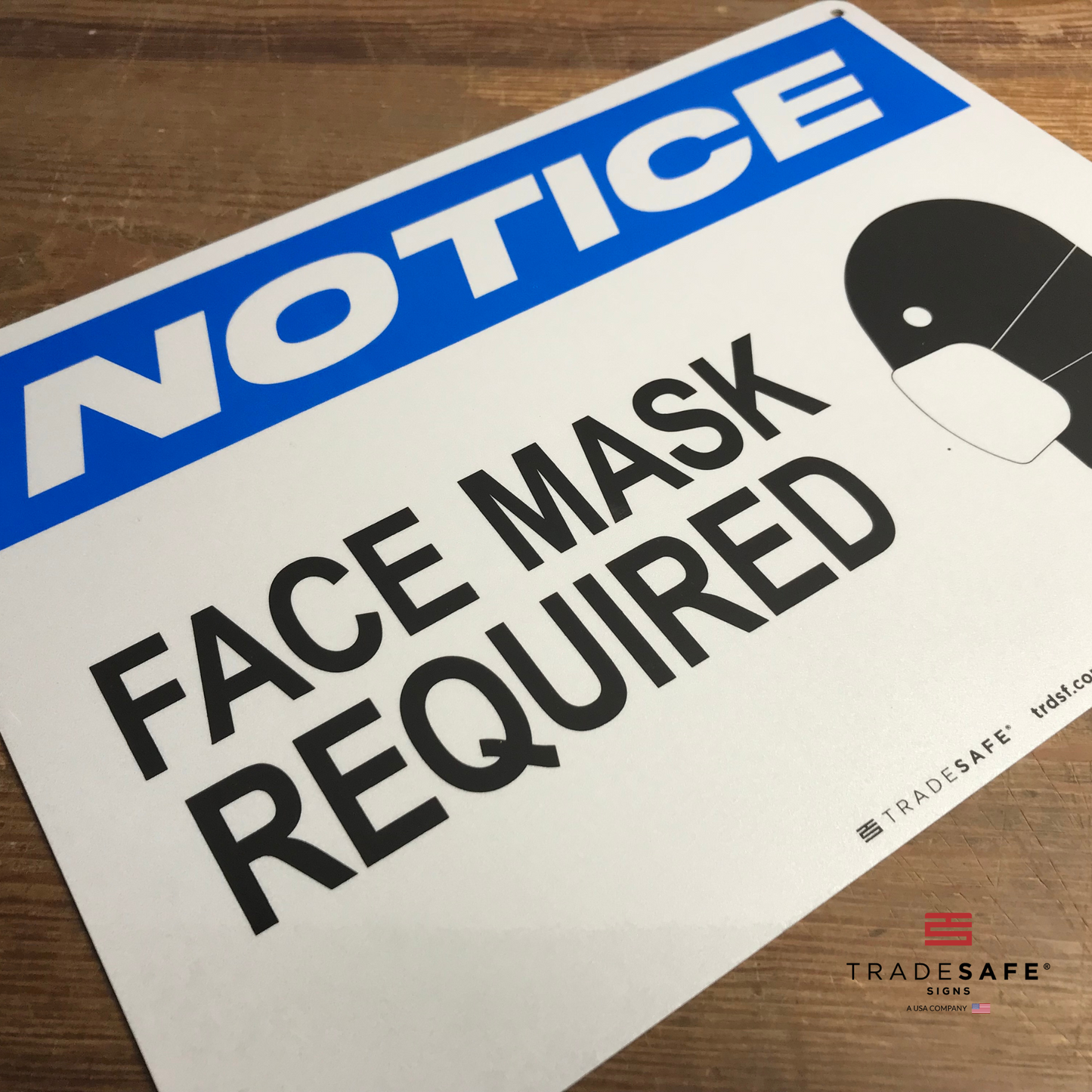 vibrant and highly visible face mask required sign