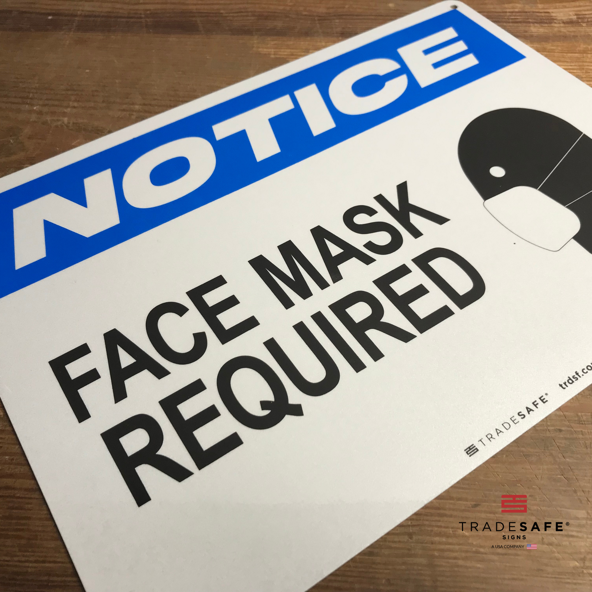 vibrant and highly visible face mask required sign