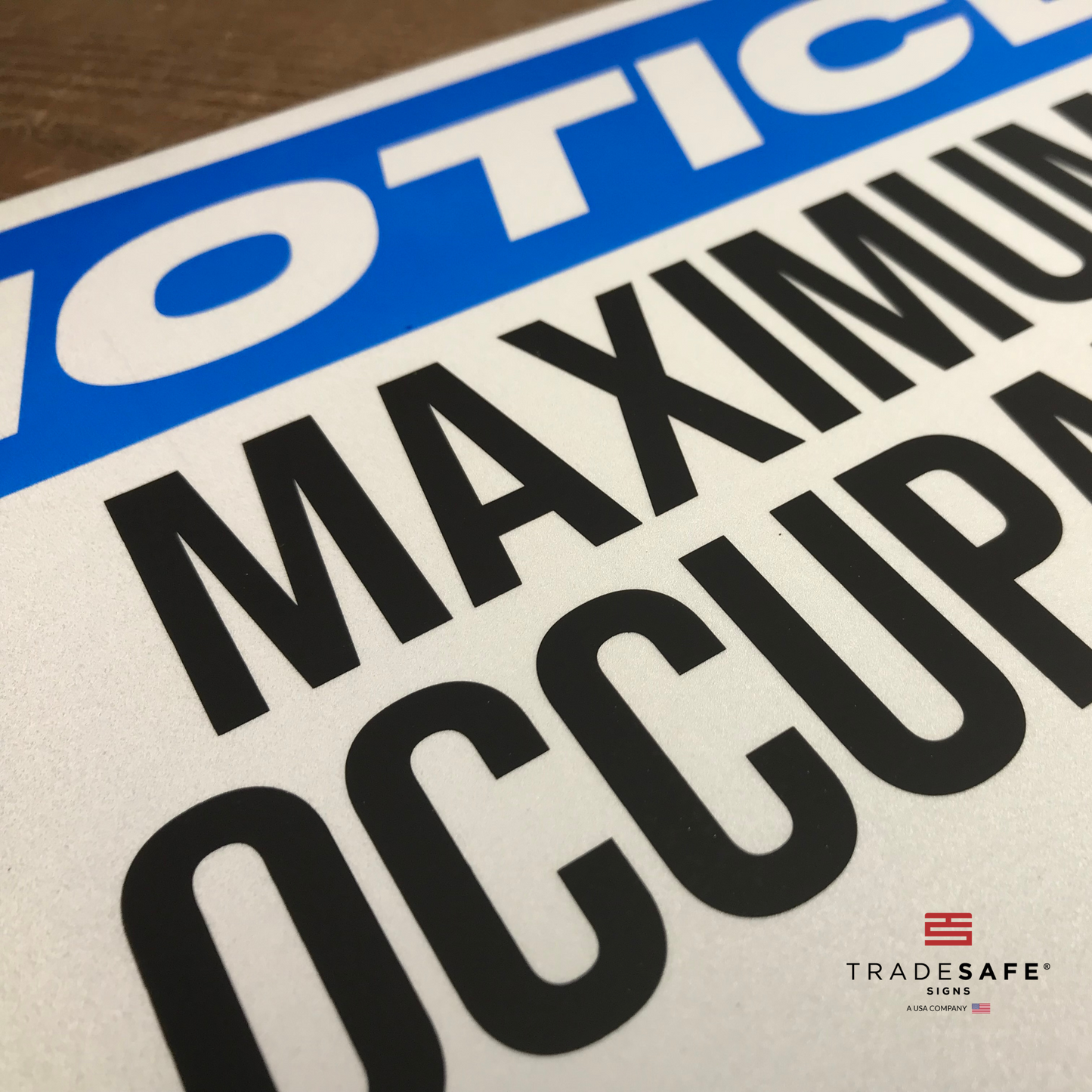 vibrant and highly visible notice maximum occupancy sign