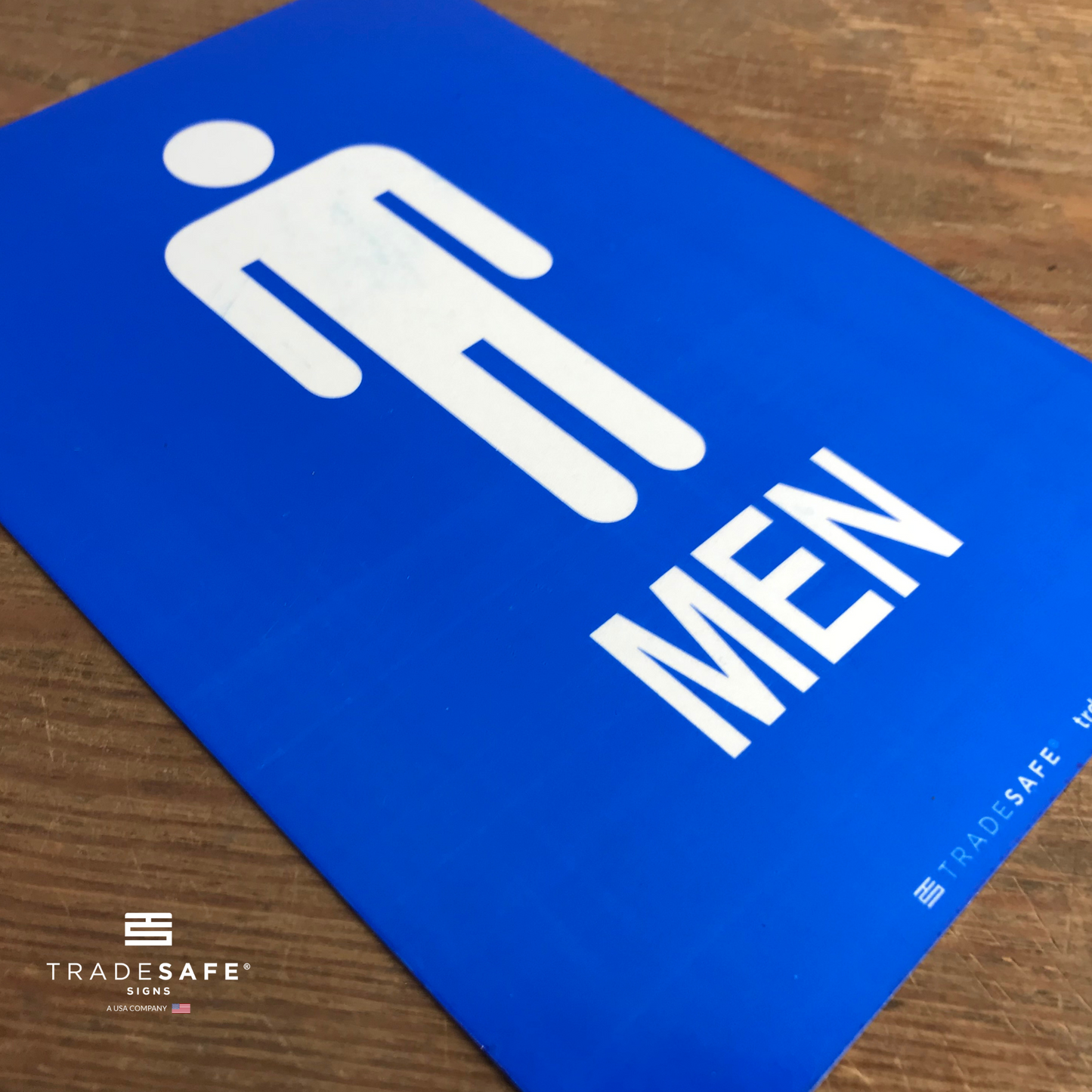 vibrant and highly visible men's restroom sign