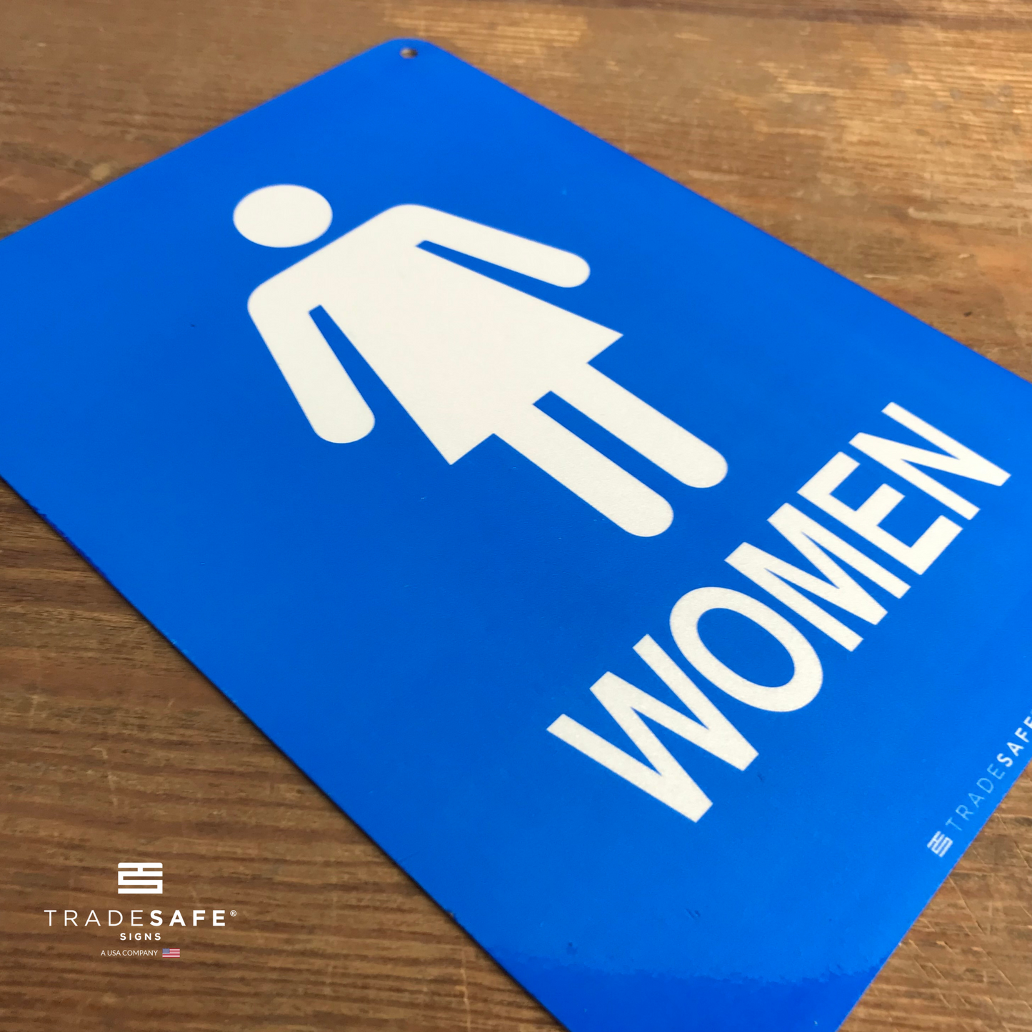 vibrant and highly visible women's restroom sign