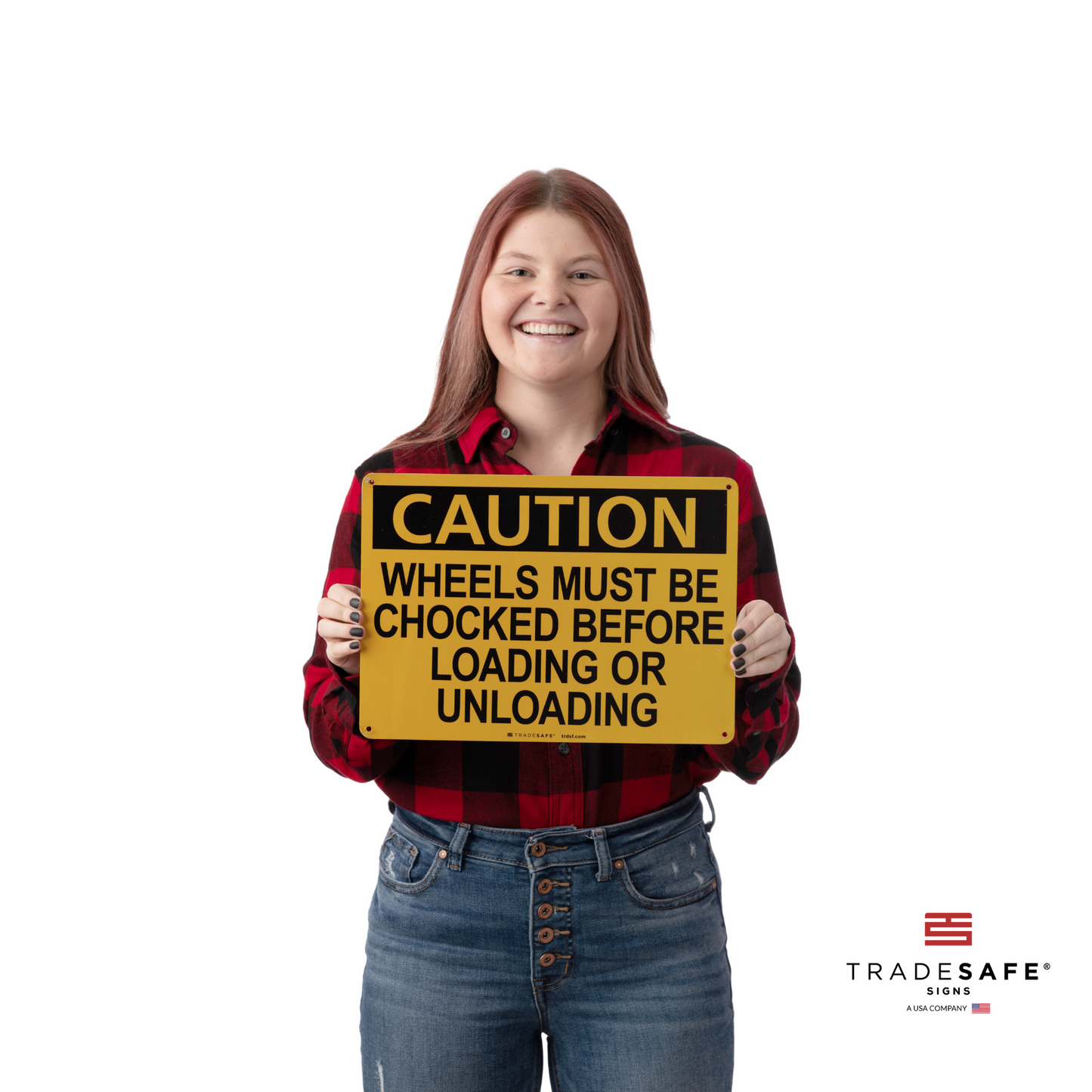 a person holding the caution sign