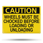 caution wheels must be chocked before loading or unloading sign